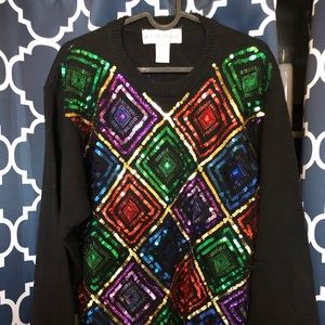 Women’s very colorful geometric design sweater.